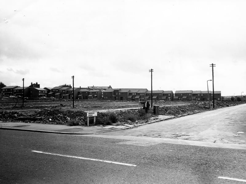 The junction of Ingram Road and Domestic Street in September 1980 showing clearance site and new council houses in the background.