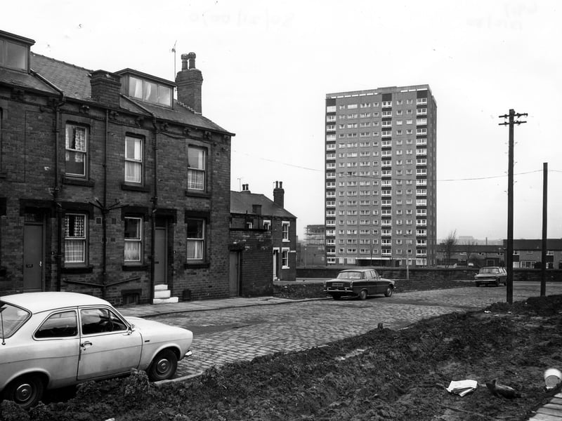 Pleasant Mount showing numbers 5 and 7 on the left. Houses to the right of these have been demolished giving a view of Pleasant Terrace behind. The tower block of Meynell Heights dominates the area. Pictured in February 1980.
