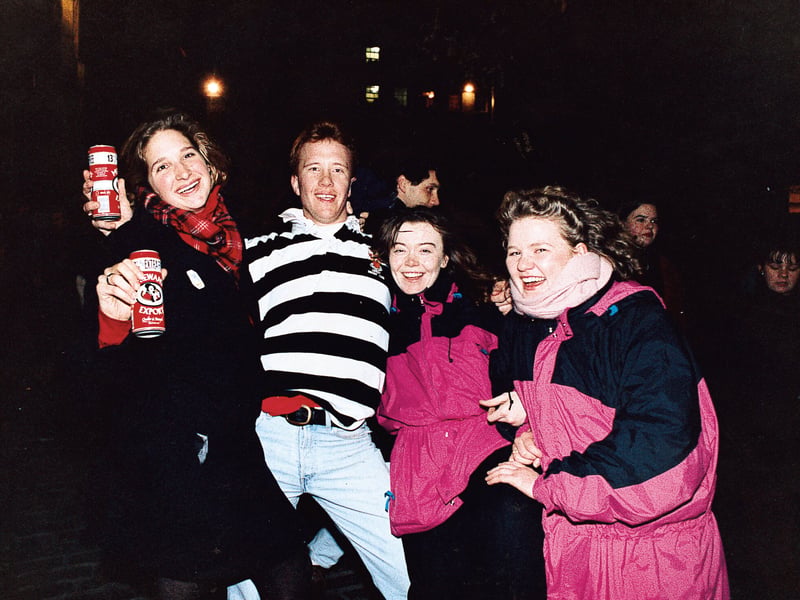 Revellers Josephine Clark, Ian Gibson, Mary Nichols and Stephanie Parkes celebrate Hogmanay on Princes Street, Edinburgh, in 1996