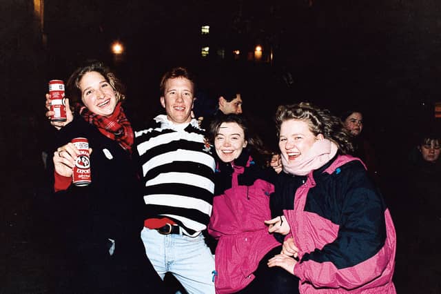 Revellers Josephine Clark, Ian Gibson, Mary Nichols and Stephanie Parkes celebrate Hogmanay on Princes Street, Edinburgh, in 1996