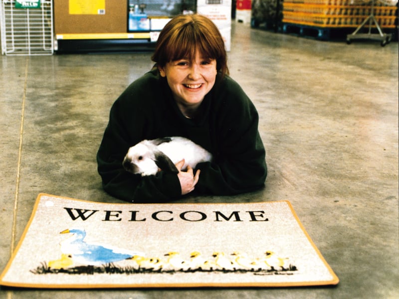 Donna Crawford, livestock manager, holding a rabbit at Pet City's new store on Glasgow Road, Corstorphine, in 1996