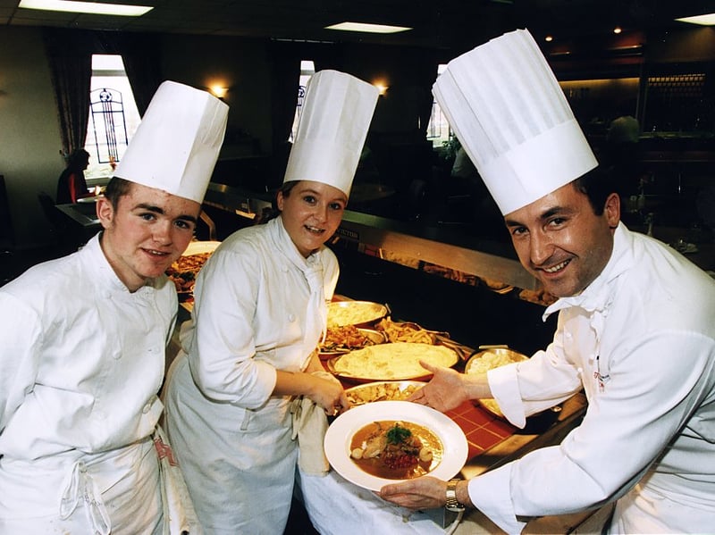 Students Ryan Godsell and Lynsey Stuart with lecturer Tom MacGregor at the Jewel and Esk Valley College Restaurant in 1996