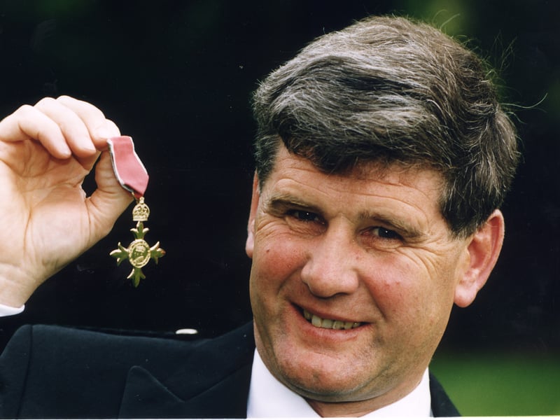 George McGregor, pictured in 1996, at the Palace of Holyroodhouse, after receiving his investiture for services to amateur golf