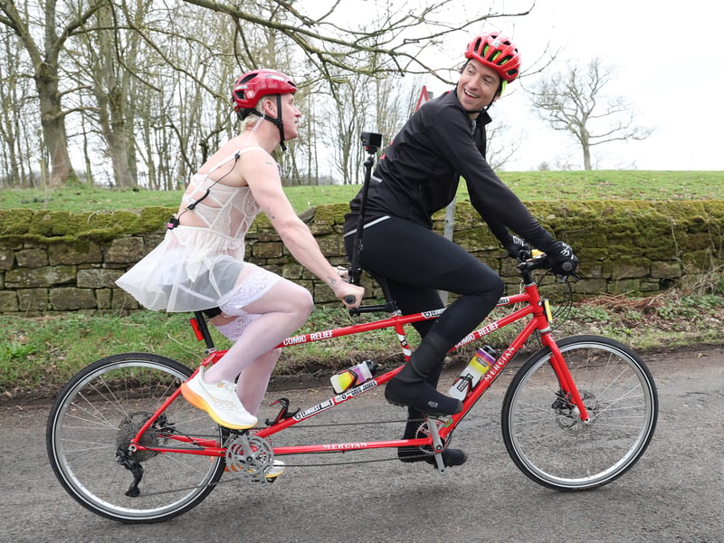 Greg James with Jamie Laing on the road during the penultimate day of the Radio 1 Longest Ride challenge for Comic Relief. 