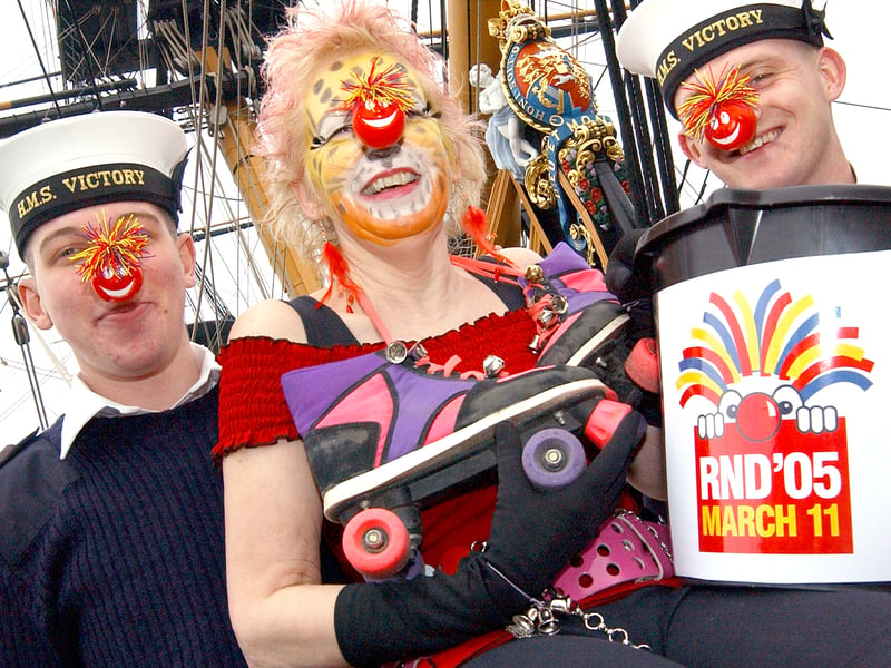 From left, operator mechanic Bez Bessell, 20, from Solihull, Lynne Turner from Southsea operator mechanic Faz Farrow, 24, from Norwich in March 2005. Lynne was dressed up as a cat on roller skates, skating round the naval base with her collection bucket