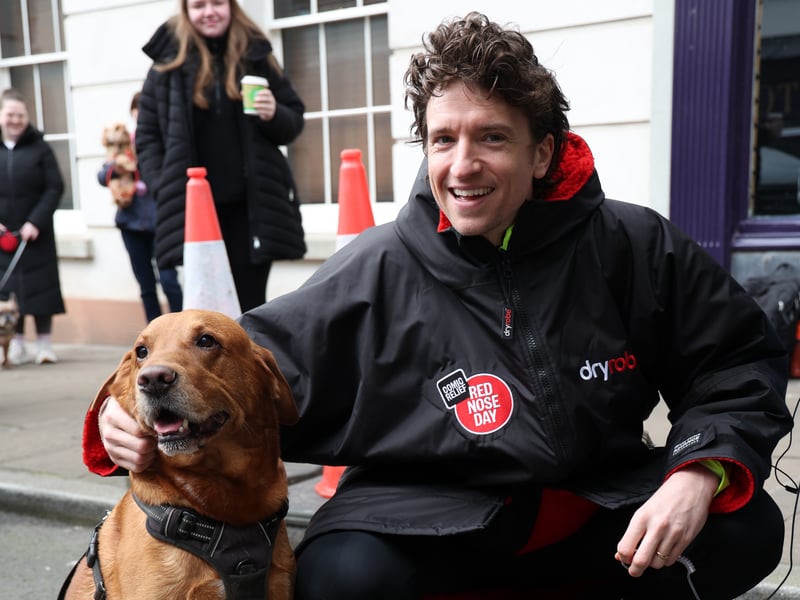  Greg James and a furry fan ahead Day 3 in Abergavenny, Wales.