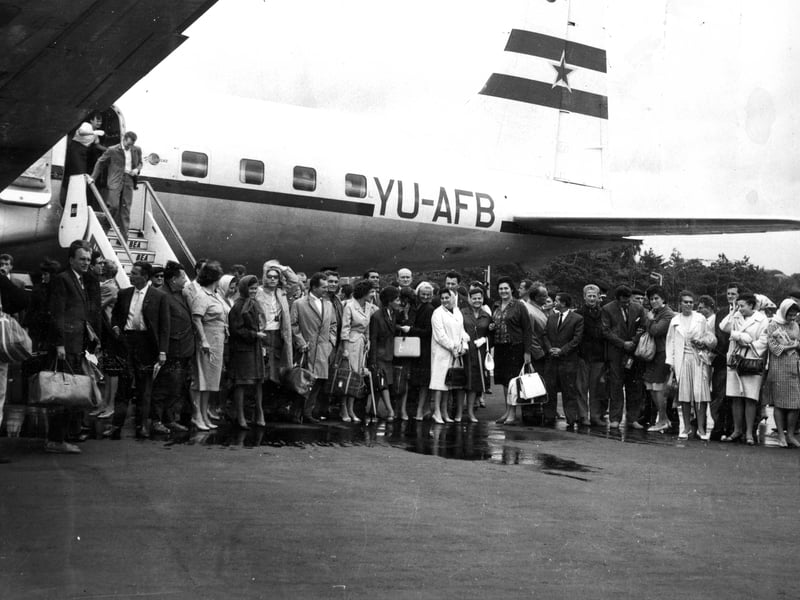 75 members of Belgrade Opera Company arrive at Turnhouse Airport in a special Yugoslav Airlines plane for the Edinburgh Festival in August 1962.