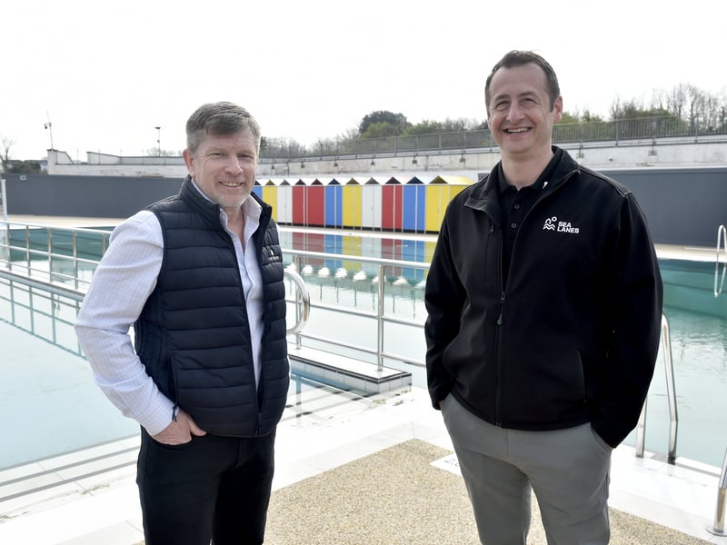 On Monday, March 23, 2026, Portsmouth City Council marked the completion of the multi-million-pound redevelopment of Hilsea Lido by officially handing the site over to its new operators.


Pictured is: (l-r) Duncan Anderson, South Downs Leisure chief executive and Harry Smith, director of Sea Lanes. 


Picture: Sarah Standing (230326-7511)