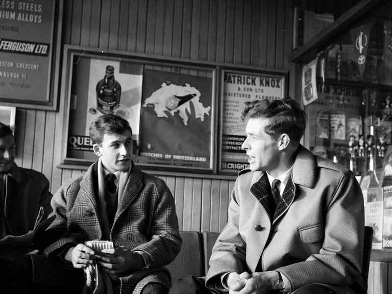 Scottish rugby players Arthur Smith and Ronnie Cowan at Turnhouse on their way to Cardiff in February 1962.