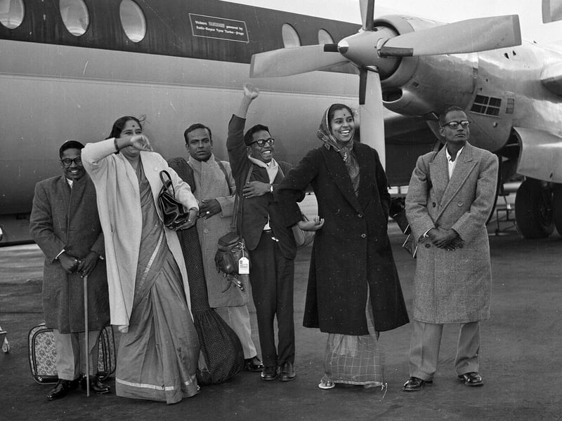 Indian dancers and performers arrive at Turnhouse Airport for a performance of Balasarasvati at the Royal Scottish Museum during the Edinburgh Festival in August 1963.