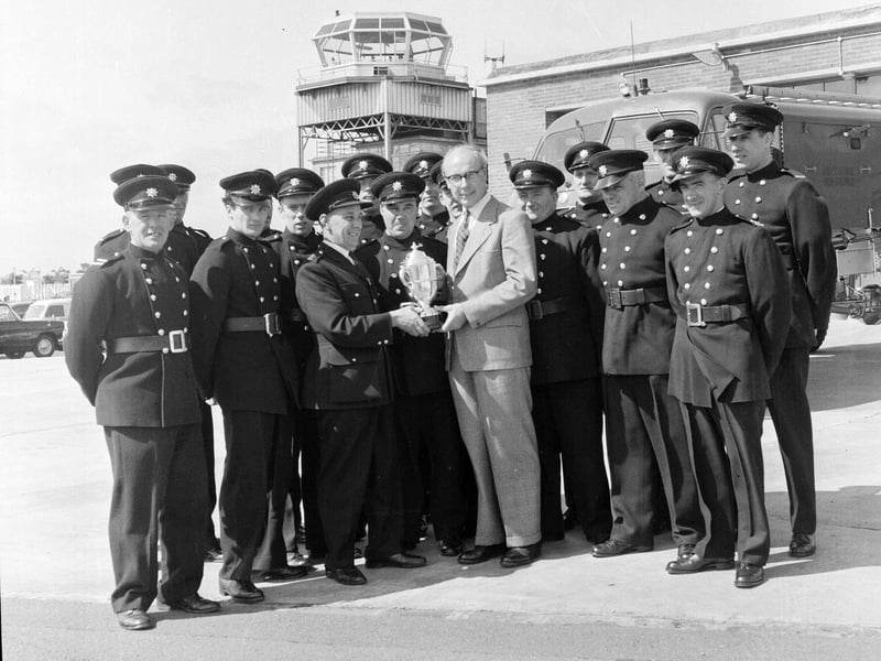 Fire service members receive the Airways Trophy from Sir Richard Way in August 1965.