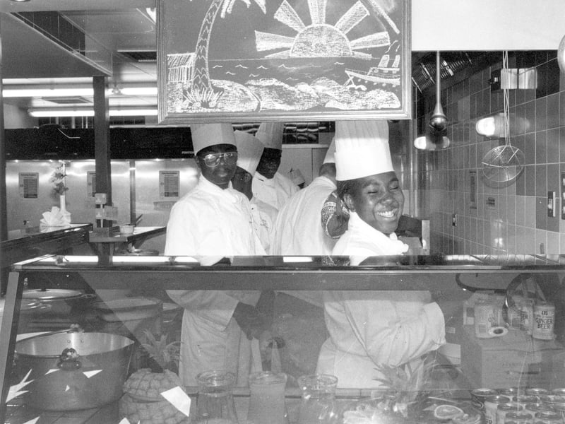 Staff behind the counter of Dr. B's Caribbean restaurant in December 1989.