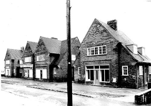 Recently built shops on Reginald Row pictured in March 1982, including Neil's Superstore second from left.