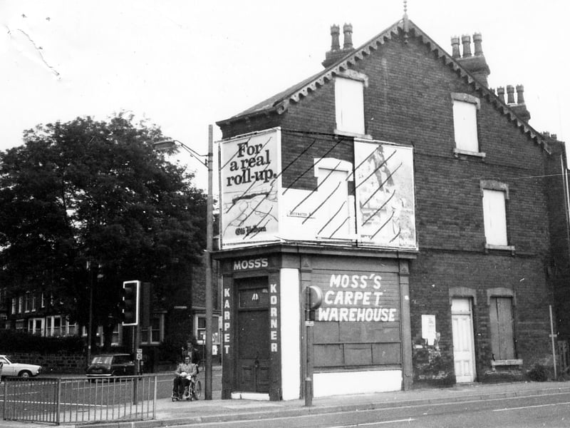 Moss's Carpet Warehouse at No.116 Roundhay Road and Bayswater Road, the latter road in the foreground of the picture. A row of terraced houses on Spencer Place can be seen going off to the left. Pictured in July 1980.