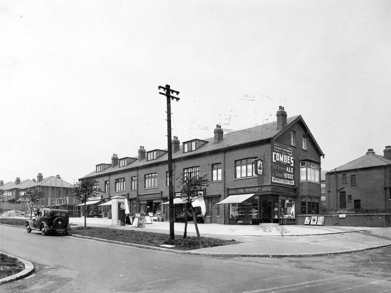 A row of shops on Easterly Road, looking from the junction with Gipton Wood Road in June 1935. The parade of shops are includes F.A Robson chemists, Beaumonts fruit shop and a bakery on the corner.