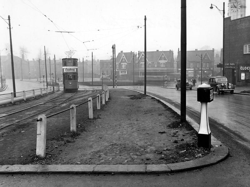 Easterly Road at its junction with Roundhay Road in December 1951. The tram has an advertisement for Cephos medicine on it. To the right the Clock Cinema is visible.
