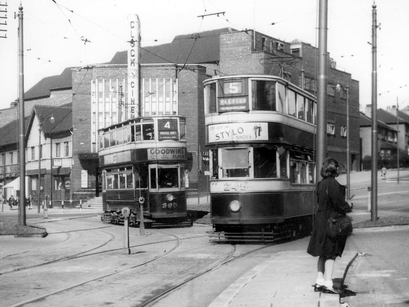 Two trams outside the Clock Cinema at the junction of Roundhay Road, left and Easterly Road, right, pictured in May 1950. In front is no.245, a Horsfield tram bound for Beeston on route no.5, and at the back is no.395, a Chamberlain bound for Kirkstall Abbey on route 4.