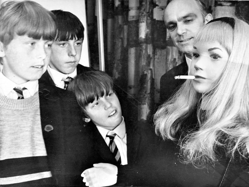 'Anti smoking talk': Pupils of Trench Modern School, from left, Paul Thompson, Aubrey Robertson, and Keith Dunn, watch Pastor Roy Burgess with smoking dummy, Suzy.'