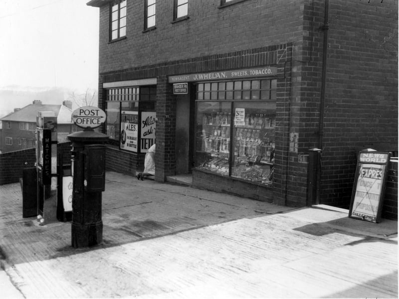 Brander Road Post Office, prop: John Whelan, which is at 72 Brander Road. Next door on the left are the grocery premises of Miss Annie Wilkinson at 74. Pictured in April 1937.