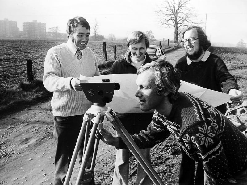 Surveying the Telford Hospital site at Apley on November 8, 1976, the site of the Princess Royal Hospital. The original caption reads: 'A team of surveyors from the West Midland Regional Health Authority visiting the Telford new general hospital site at Apley, Wellington. They are Mr Frank Morris, Mr Roger Grainger, Mr Andrew Parbury, and Mr Paddy Waldron.'