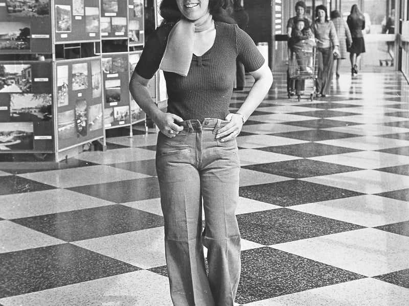 'Pat Fudge, an accounts clerk at Telford centre. Pat is the wife of Mickey Fudge, the Telford United forward. Pat has two sons and lives at Muxton.' The picture was taken on April 30, 1976, at Telford shopping centre.``