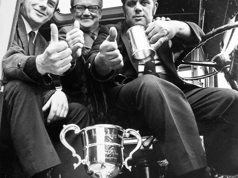 Excelsior, a bus and coach firm based in Wrockwardine Wood, was founded by Alf Price in 1920. This image was taken after the company won a cup in 1976 at the Blackpool National Coach Rally—Reg noted they were the only coach operator to receive an award at the event. Pictured, from left, are Alan Pugh, who worked part-time for Excelsior; Reg Price, Alf’s son and the firm’s owner; and driver Alan Stevens.