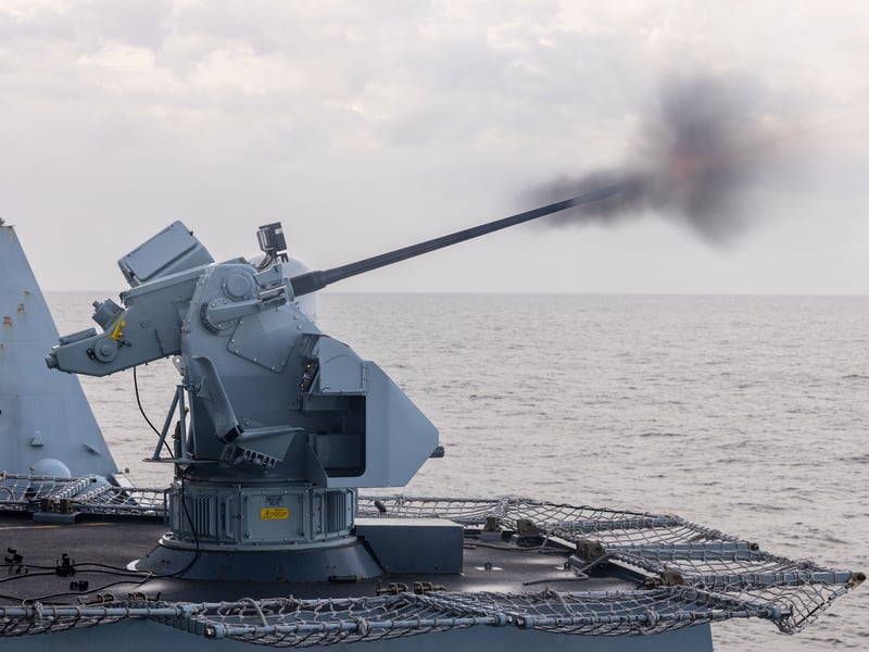 HMS Dragon conducting Gunnery serials at sea using the ships 4.5 gun, 30mm (pictured) and phalanx weaponry as part of Fleet Operational Standards and training exercises.