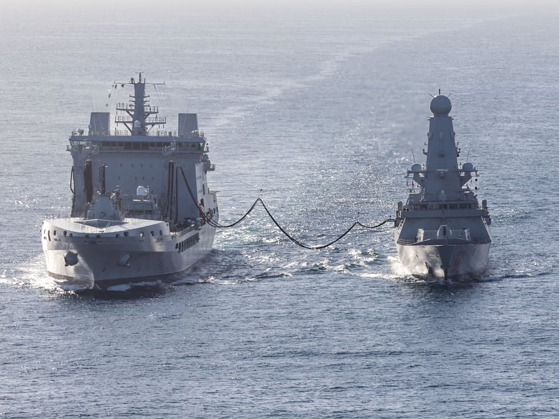 Pictured: 18 Mar 2026 - HMS Dragon (right) conducting a Replenishment at Sea with RFA Tideforce whilst undergoing Fleet Operational Standards and Training.