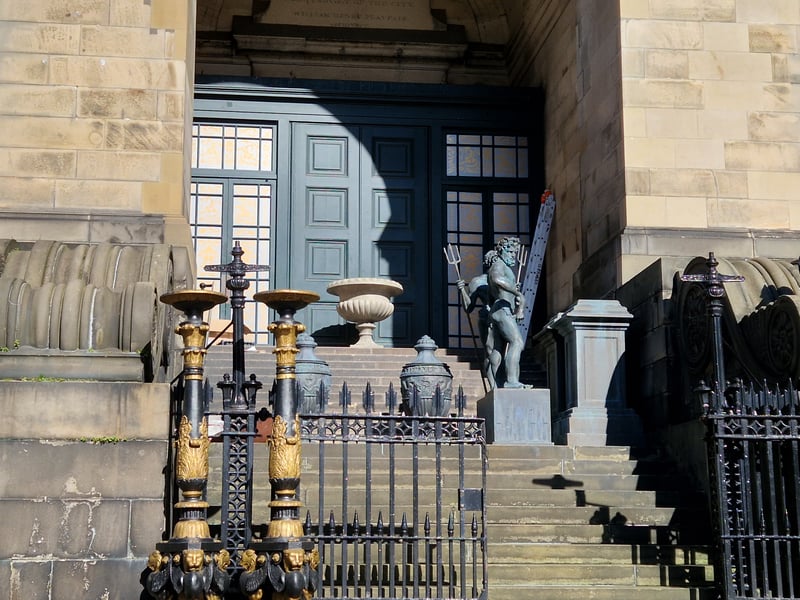 St Stephen's Church is being dressed and transformed with Regency-era props being moved into place by crew members.