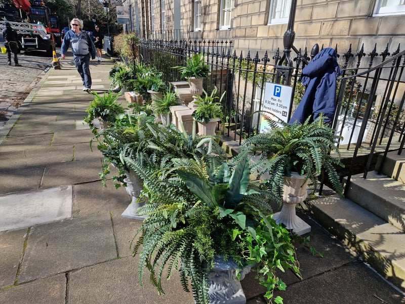 A number of Regency-era props were seen lining the streets, including North East Circus Place, as crews set up for filming.