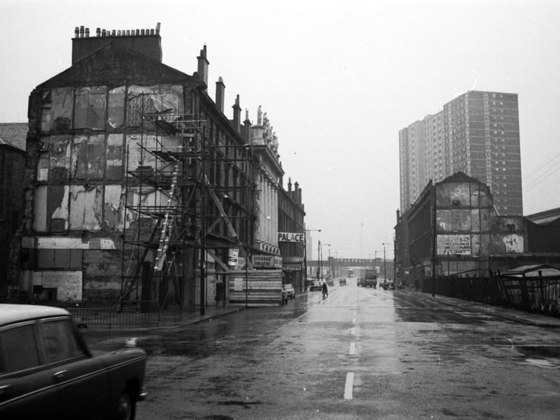 High-rise buildings overshadow the Palace bingo hall and Citizens Theatre on Gorbals Street, Glasgow, in February 1976