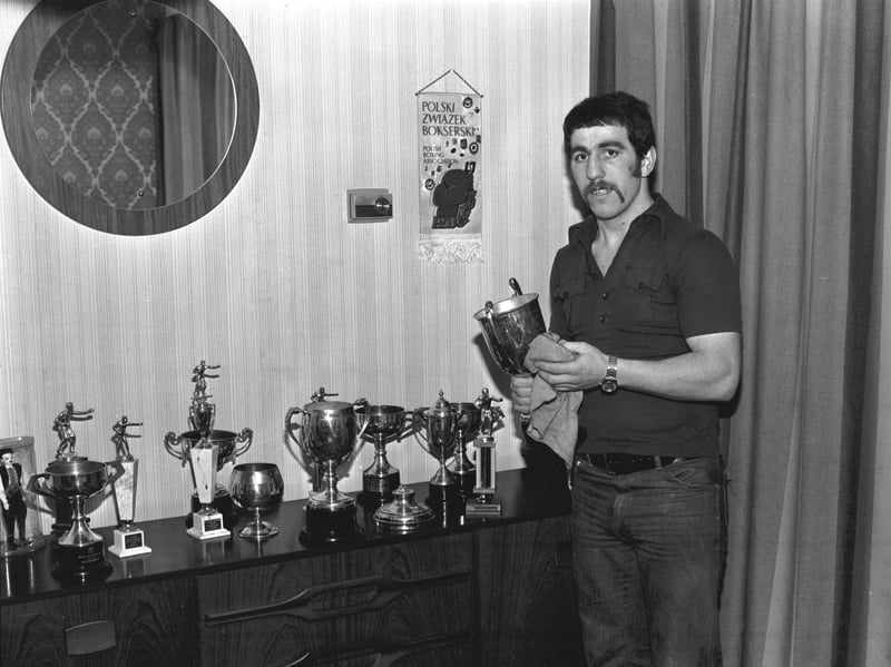 Scottish International boxing champion Cy Harrison with  some of his trophies in January 1976