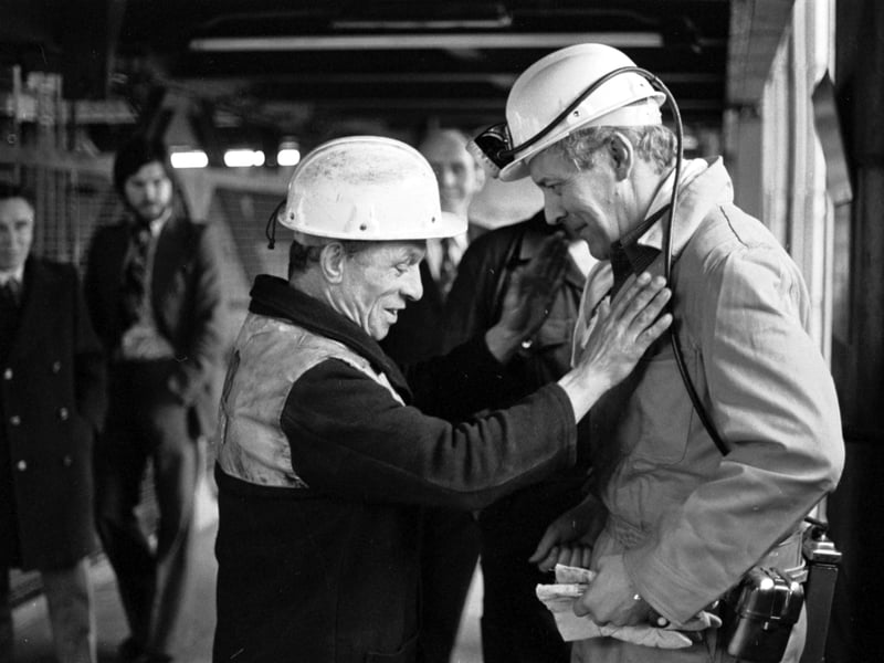 Anthony Wedgwood-Benn (Tony Benn) gets his miners' lamp and helmet checked by the banksman before going down Killoch colliery in Ayrshire in April 1976