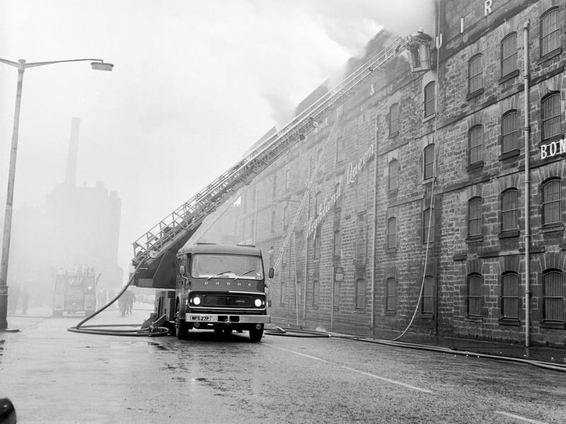 At least three fire engines attend a fire at McDonald & Muir whisky bond on Commercial Street, Leith, in April 1976