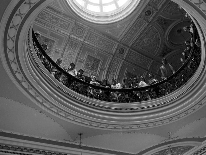 Students from Jordanhill College peer down over the bannister during their occupation of Glasgow City Chambers in May 1976