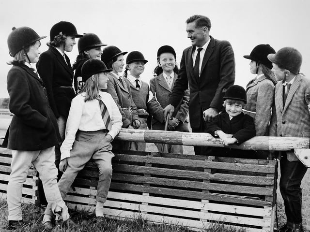 'Well known Shropshire steeplechase jockey Tim Brookshaw has some words of advice for competitors at Hughley Gymkhana' is the caption typed at the bottom of this print. It is undated.