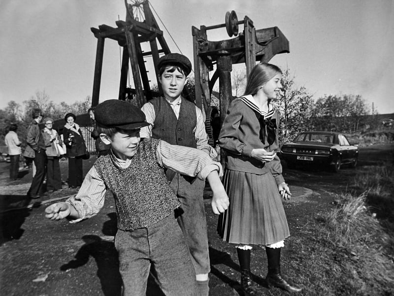 'Film heroes, from left, Benjie Bolgar, Andrew Harrison and Chloe Franks' and the accompanying story said: 'Just two and a half minutes of screen time will be the result of a day's recording by a Walt Disney film crew at Telford's Blists Hill museum. The 60 film crew members, who moved into the Prince Rupert and Lion hotels in Shrewsbury, were shooting a sequence yesterday for a new Disney production, Pit Ponies. The open-air museum was chosen for the location after a countrywide search. The film, set in a north of England mining community in 1909, will feature the museum's restored winding-engine room.' November 1975.