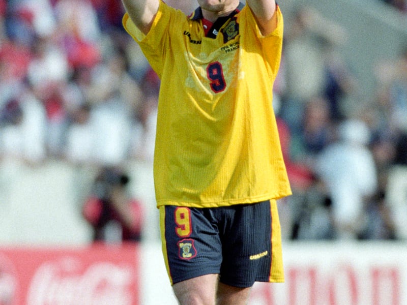 And finally, our winner. The yellow and navy Umbro number Scotland wore at their last World Cup in 1998. Made famous by Craig Burley, Gordon Durie and Gary McAllister, it had everything. The button-up collar, complete with the little Scotland flag. The red piping just makes the navy and yellow pop even more, too. It may not be associated with the best memories, but this is our number one. Iconic.