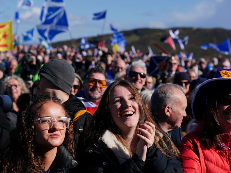 The crowd applauded and shouted their support as the speakers preached the independence message