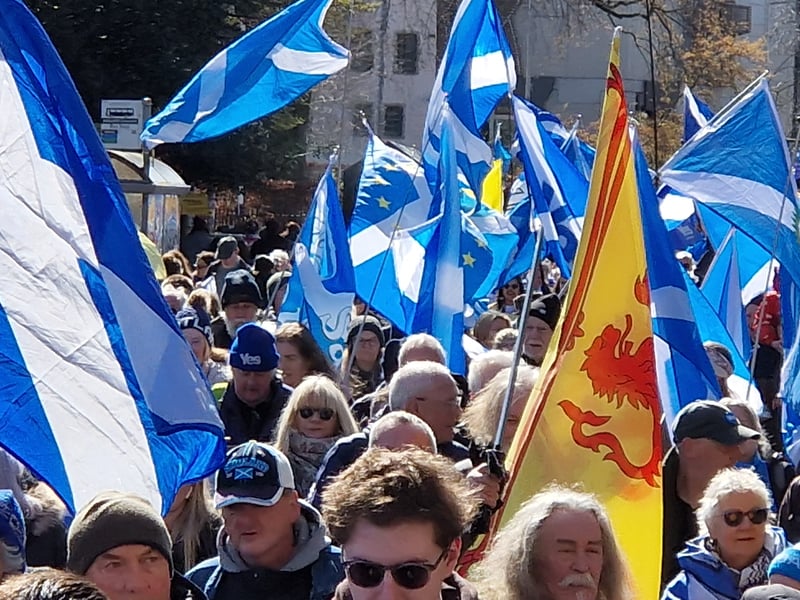 The many Saltires made a colourful spectacle as the crowd marched down the Royal Mile in the sunshine