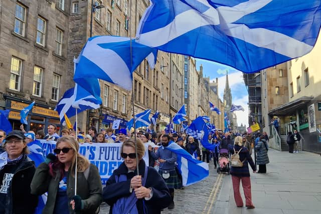 The Believe in Scotland march began at Parliament Square and proceeded down the Royal Mile, Saltires flying in the wind.