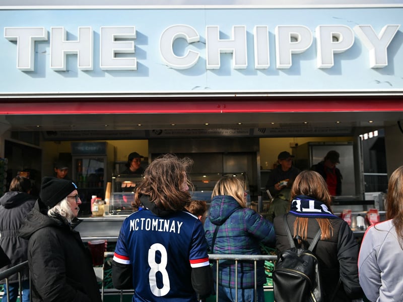 Scotland fans buy refreshments ahead of the game.