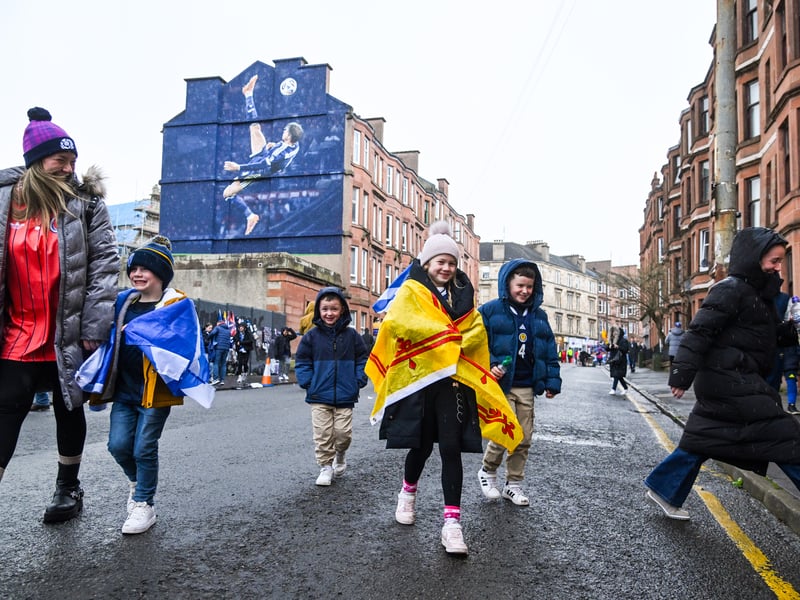 A family of Scotland fans head to the game vs Japan.