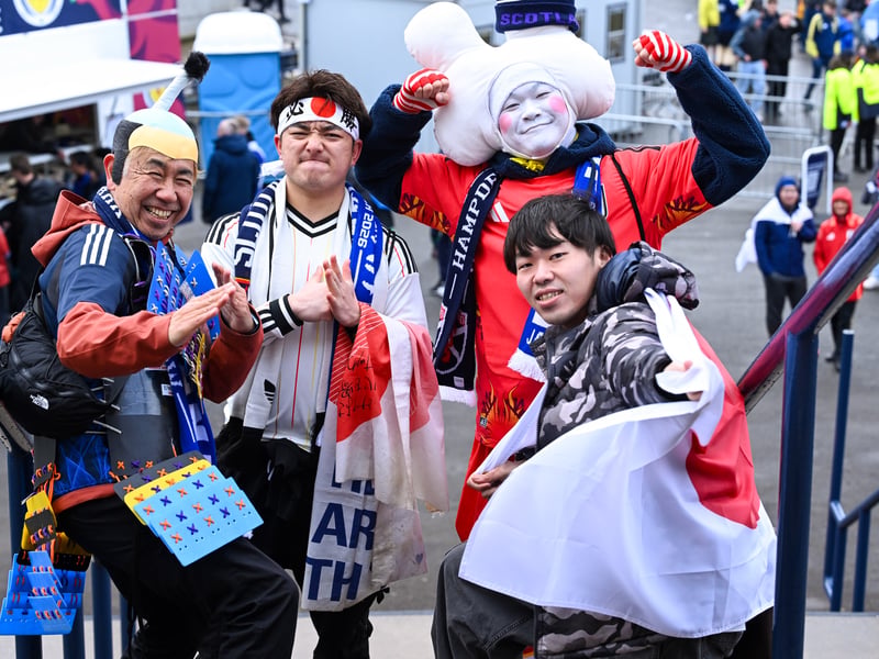 Japan fans on the Hampden stairs before kick-off again Scotland.