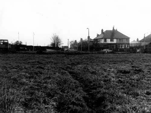 A view looking East from a field across Henconner Lane, towards Bramley Bus Station in December 1968.