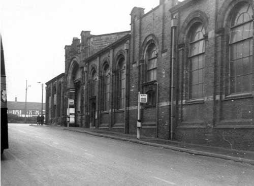 A view of the south west side of Bramley bus garage. Junction with Green Hill Road visible. Pictured in November 1968.