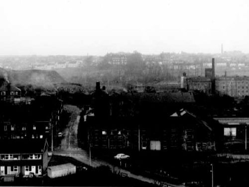 The junction of Pudsey Road, Hough Tree Road and Wood Lane in December 1968. House End Mills in foreground on the corner of Pudsey Road and Hough Tree Road.