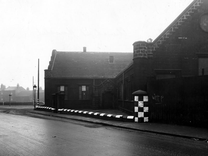 The premises of acid manufacturers John Nicholson & Sons Ltd. on Church Street, near the junction with Balm Road (on the left). The building, which was previously a school, has black and white checks and stripes for visibility during air-raid blackouts. Pictured in January 1943.