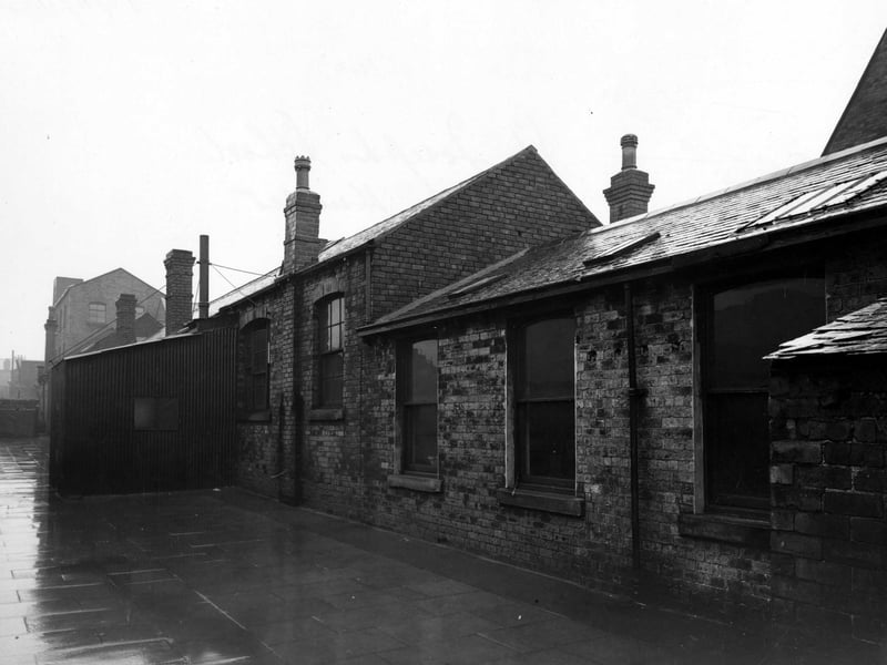 The single storey brick-built buildings of St. Joseph's R.C. School in November 1946. On the left is an extension made of corrugated iron. The extension was a boiler house.