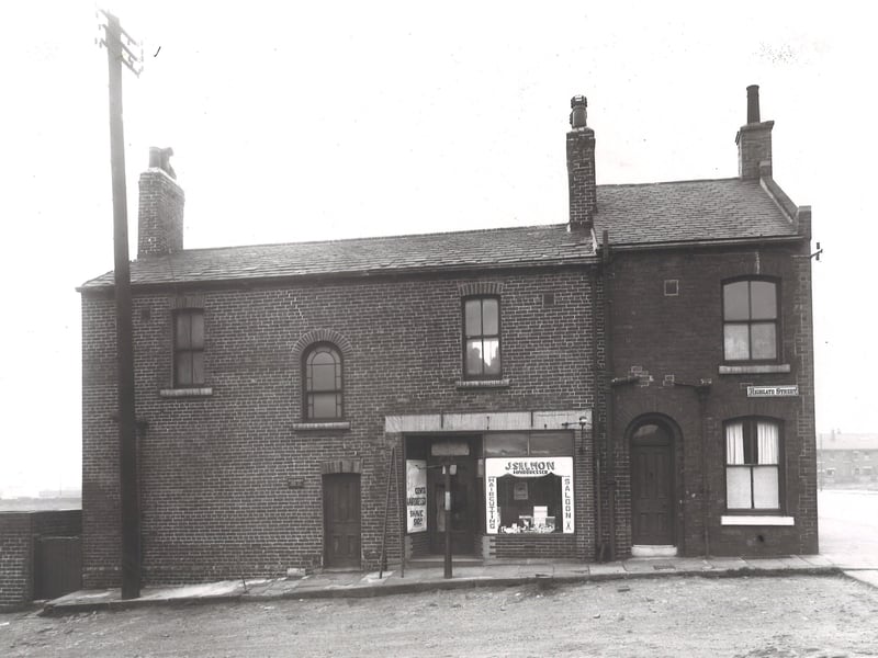 Number 6 (house) and number 7 J. Salman, hairdresser on Highgate Street, off Low Road. Old Mill Lane visible in the background. Pictured in July 1948.